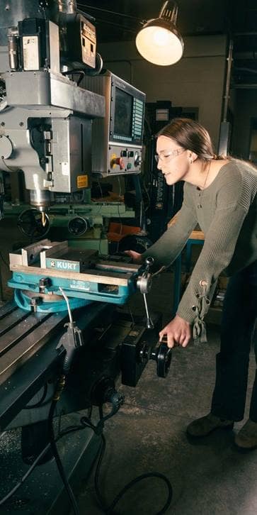 Katie Rolle operating equipment in the AXFAB lab on the Prescott campus, (Photo: Embry-Riddle / Connor McShane)