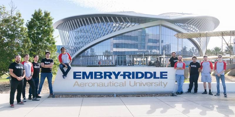 Visiting students from the University of Chile work alongside their ERAU peers on a group of satellites destined for Low-Earth Orbit in the College of Arts and Sciences Space and Atmospheric Instrumentation Lab (SAIL) on March 1, 2022. (Embry-Riddle / Bernard Wilchusky)