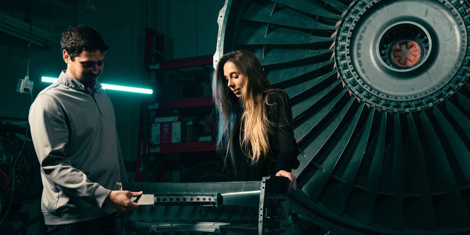 Embry-Riddle aerospace engineering students working on an aircraft