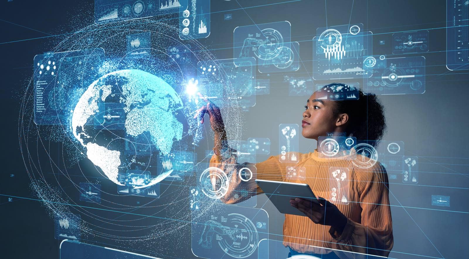 Woman in front of a graphics screen.